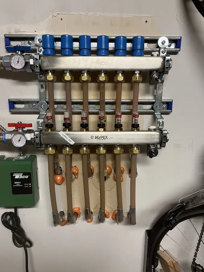 Plumber performing Gas Leak Detection at a residential property in Atchison